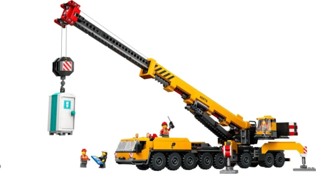 Yellow Mobile Construction Crane set photo